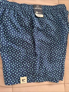 George Navy Blue Shorts with Aqua Dot Print
New with tags mesh lining